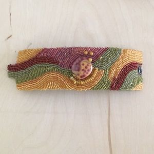 hand beaded leather cuff. one of a kind.